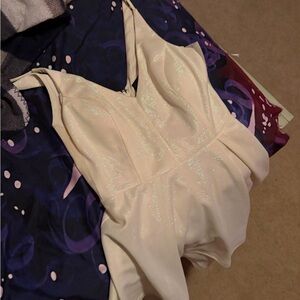 Shimmering White Sleeveless Romper